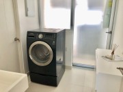 Apartment for sale in country towers laundry area