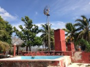 Cattle ranch near Merida. Weather vane and and tank