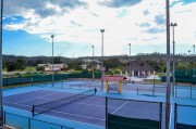 Lot for sale in a gated community Campeche Country Club. Tennis court
